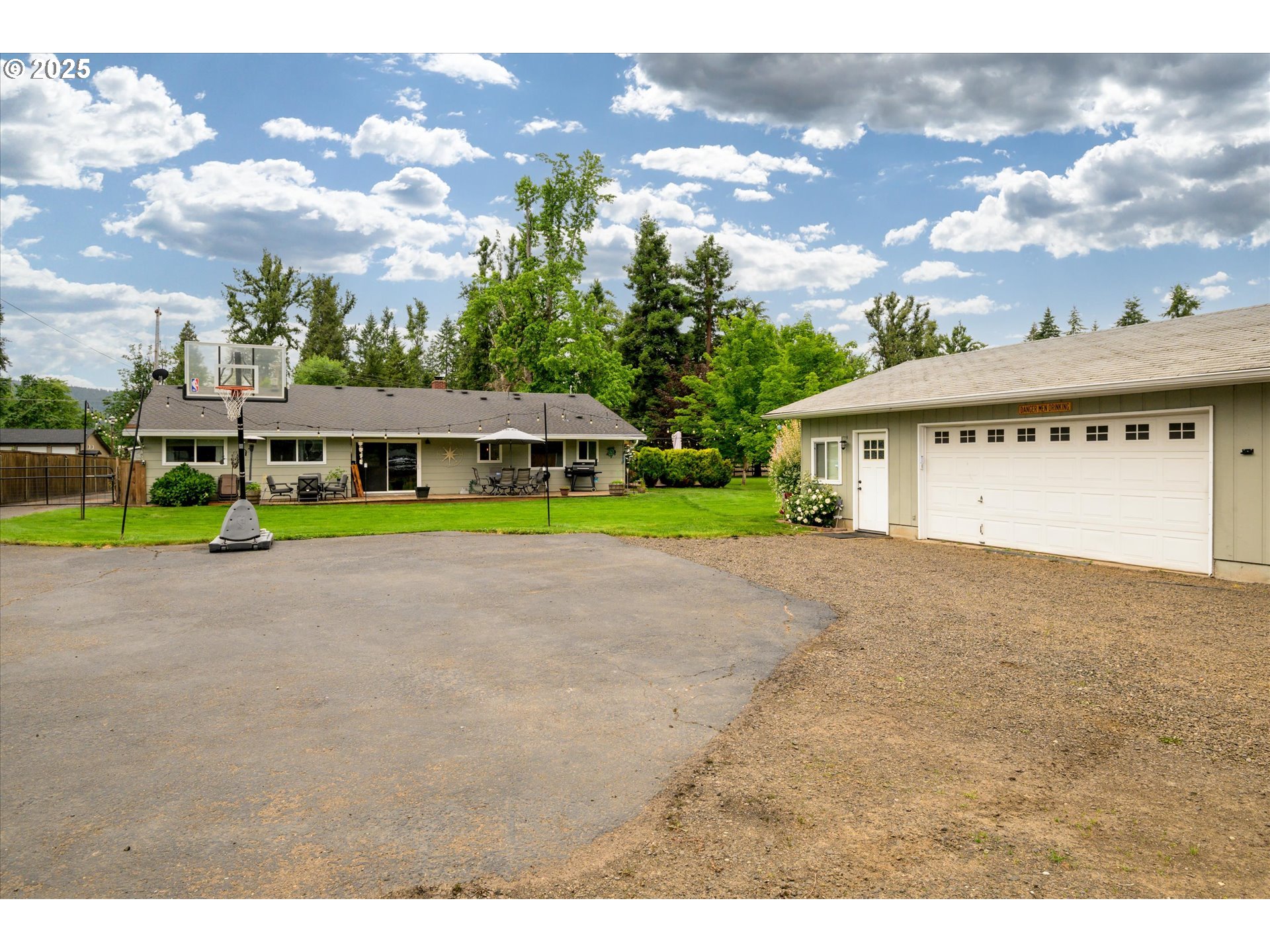 37807 Camp Creek Road Springfield, OR 97478 - Photo 33 of 40 a view of house with outdoor space and swimming pool