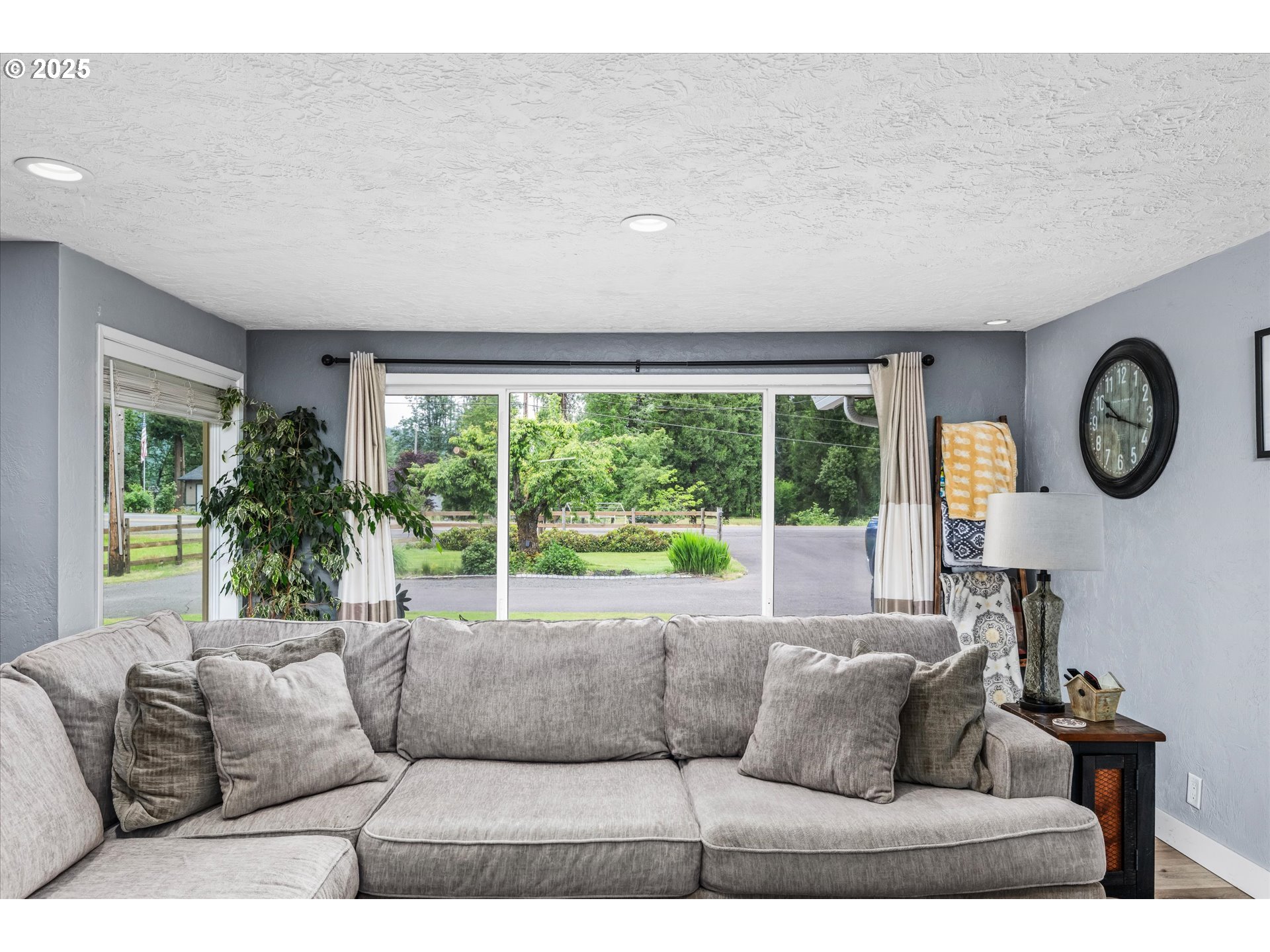 37807 Camp Creek Road Springfield, OR 97478 - Photo 8 of 40 a living room with furniture and a large window