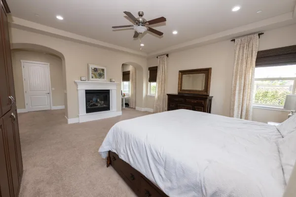 a view of a patio with dining table and chairs with a yard