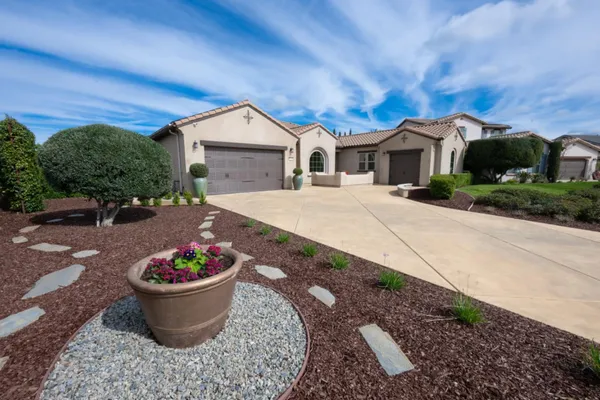 a front view of house with a yard