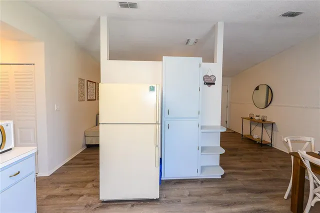a view of kitchen and utility room