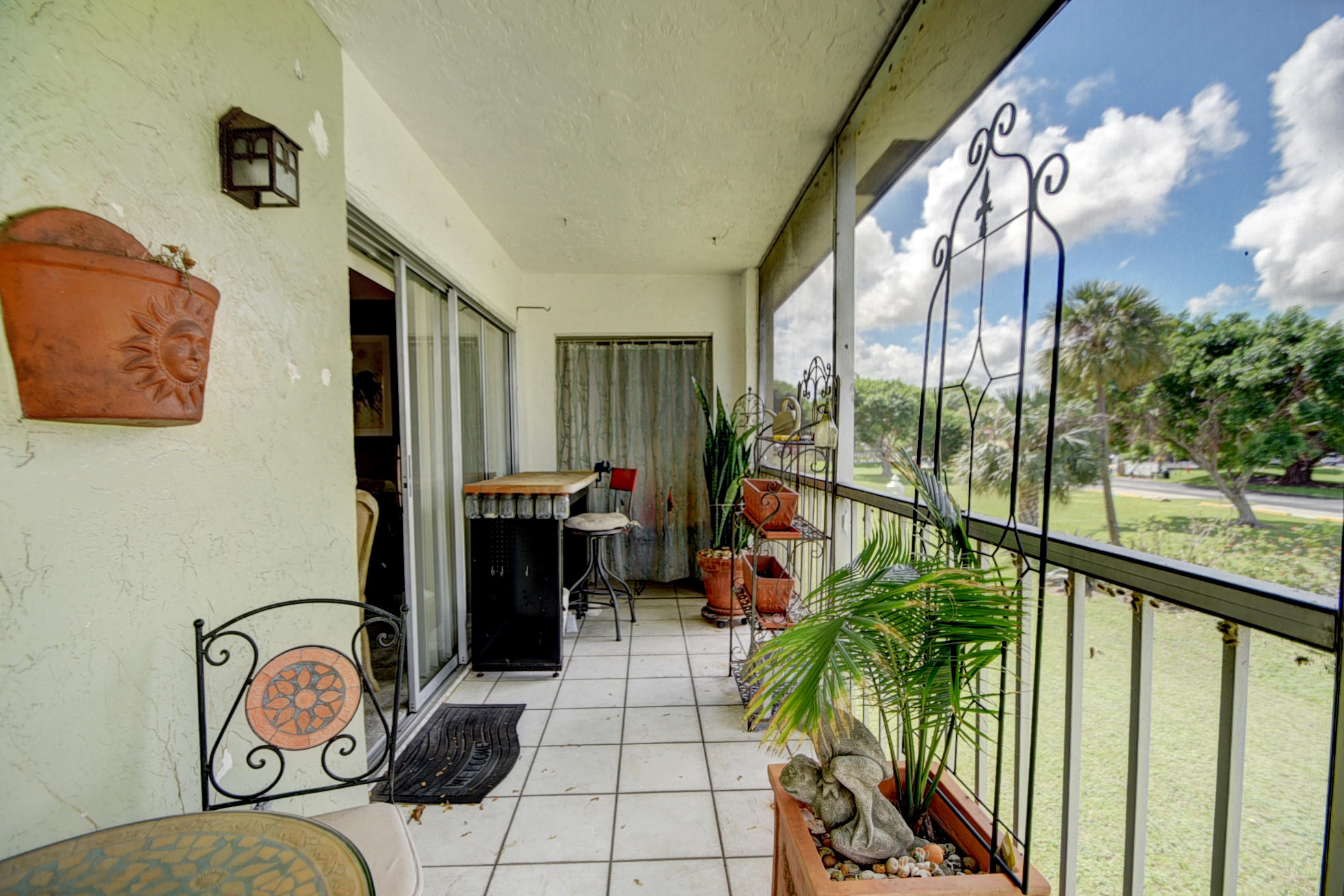 9210 Southwest 3rd Street, Unit 217 Boca Raton, FL 33428 - Photo 16 of 18 SCREENED PORCH