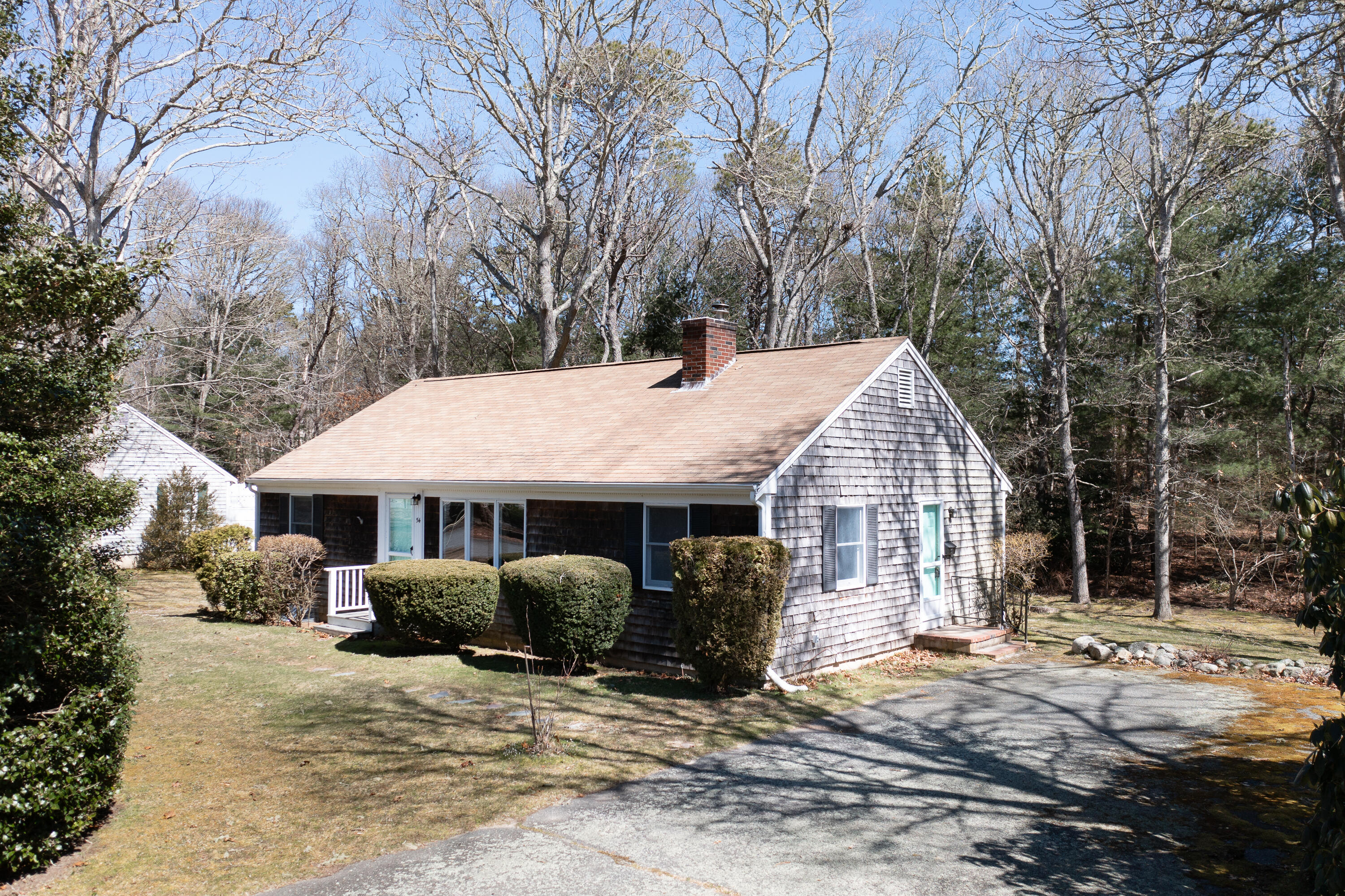 54 Hinckley Circle Osterville, MA 02655 - Photo 23 of 30 a view of a house with a yard covered in snow