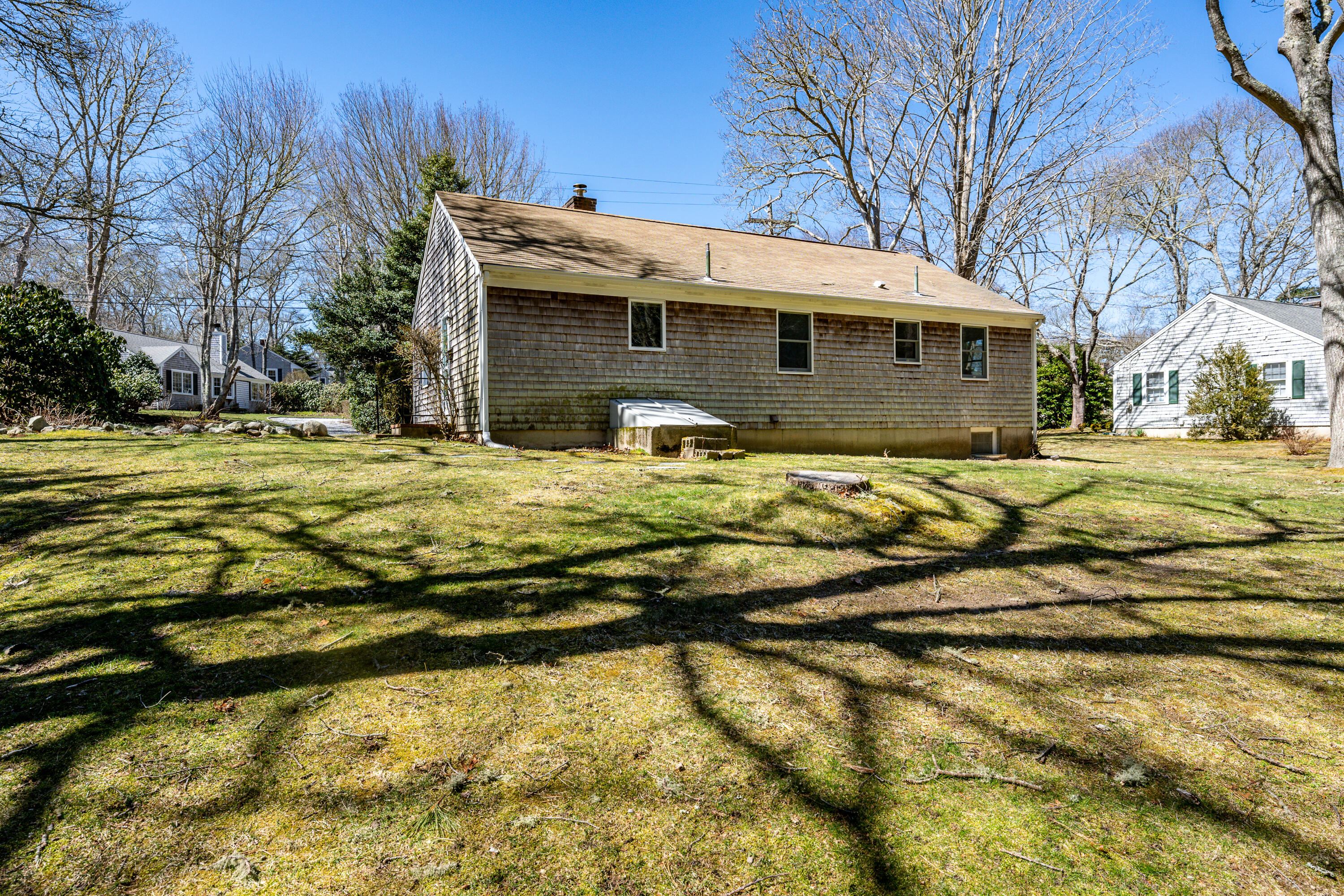 54 Hinckley Circle Osterville, MA 02655 - Photo 25 of 30 a view of a house with a yard