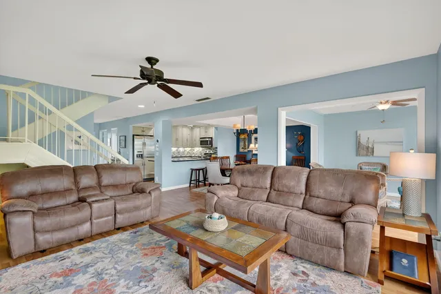 a bedroom with a bed and a large mirror