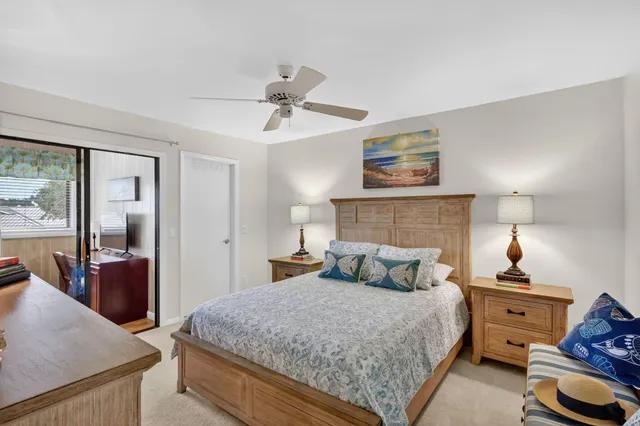 a front view of a house with a garden and porch