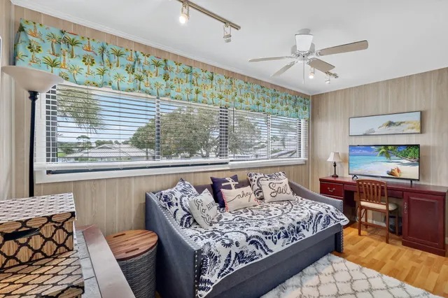 an aerial view of a house with a lake view