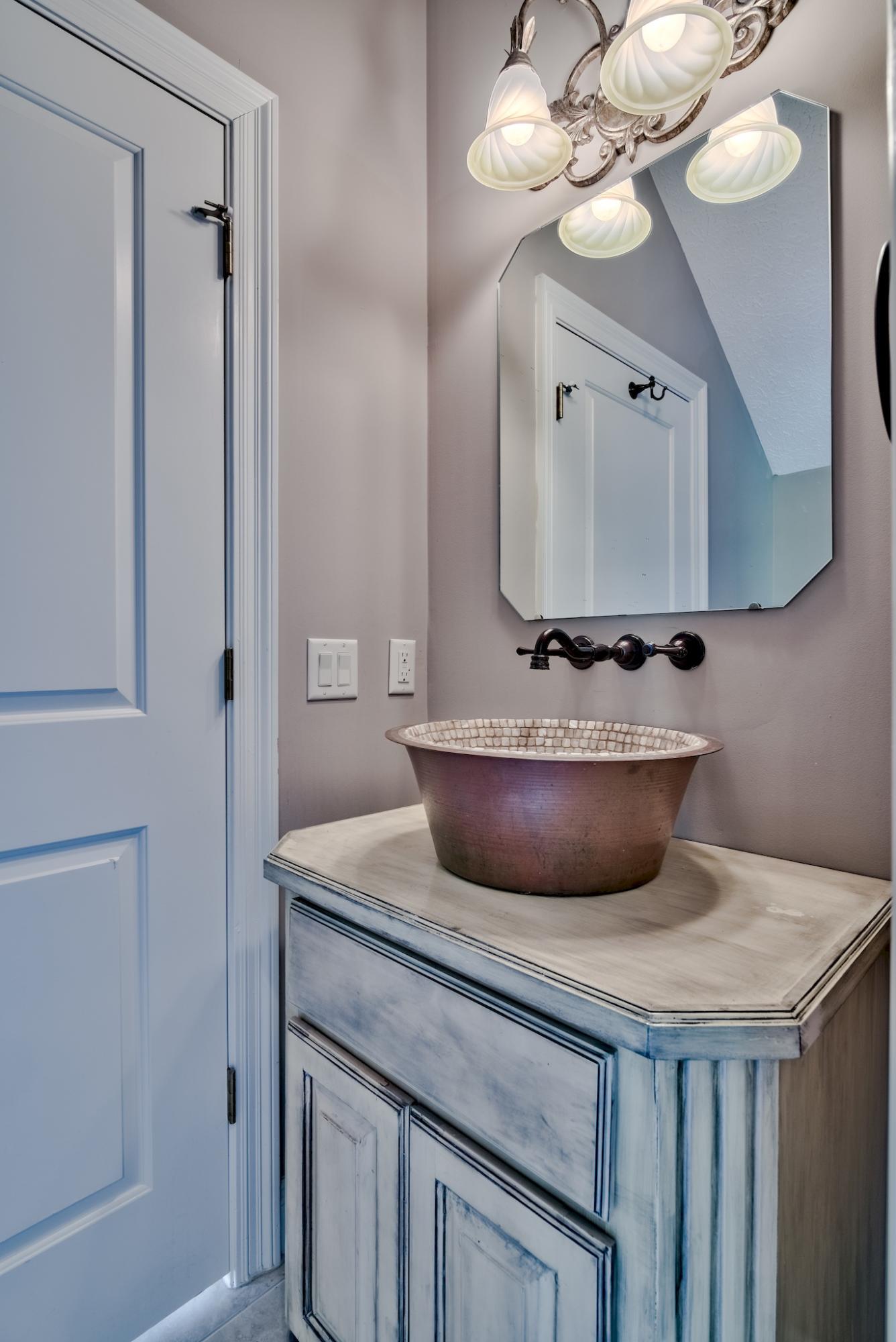 103 Pelican Glide Lane Inlet Beach, FL 32461 - Photo 25 of 47 a view of a room with a sink and chandelier