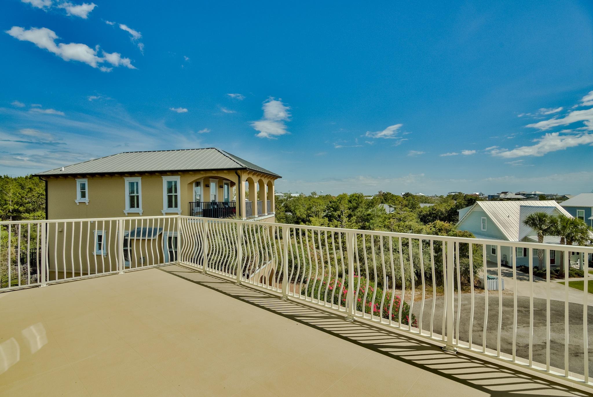 103 Pelican Glide Lane Inlet Beach, FL 32461 - Photo 40 of 47 a view of a house with a balcony