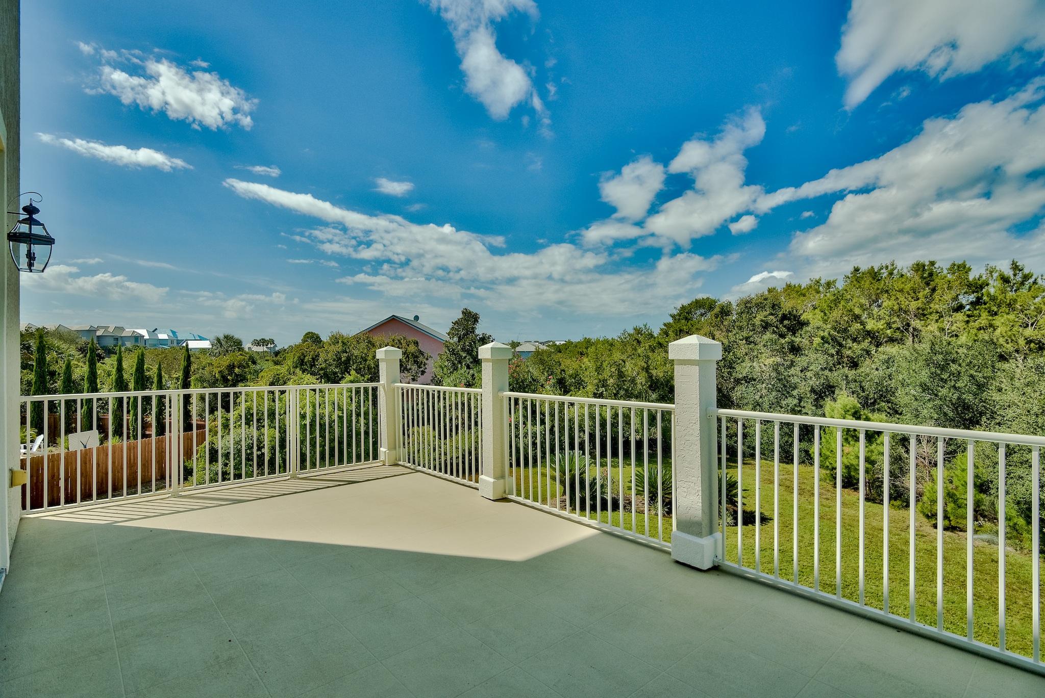 103 Pelican Glide Lane Inlet Beach, FL 32461 - Photo 43 of 47 a view of a balcony with a swing
