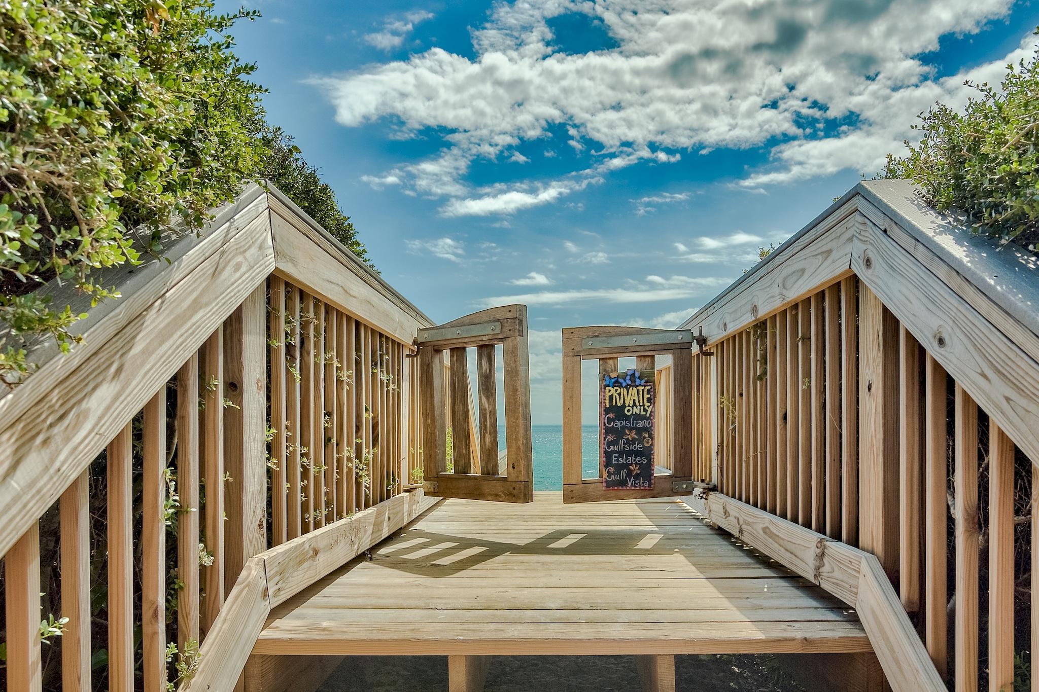 103 Pelican Glide Lane Inlet Beach, FL 32461 - Photo 45 of 47 a view of balcony with wooden floor and fence