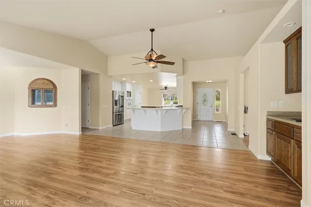 a view of a kitchen with a sink and a stove top oven