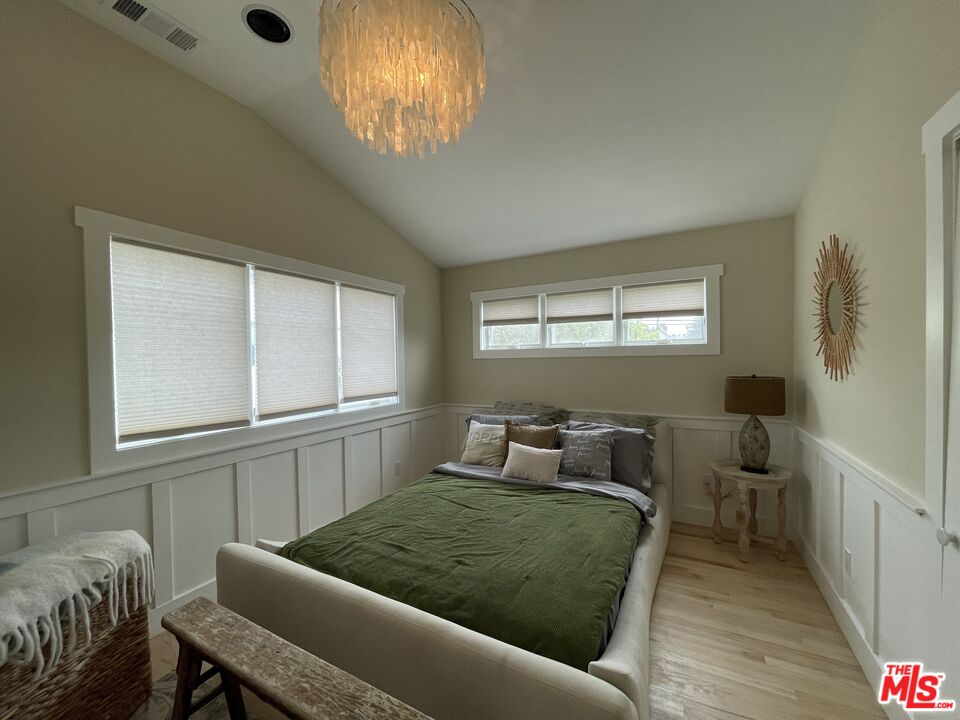 722 Palms Boulevard Venice, CA 90291 - Photo 13 of 19 a bedroom with a bed and window