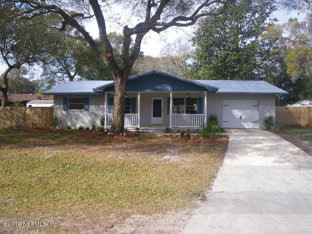 402 Jasmine Road St. Augustine, FL 32086 - Photo 1 of 33 a front view of a house with garden