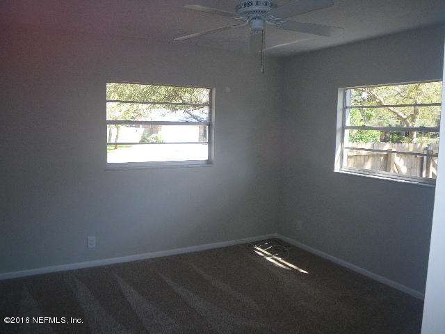 402 Jasmine Road St. Augustine, FL 32086 - Photo 11 of 33 an empty room with a window