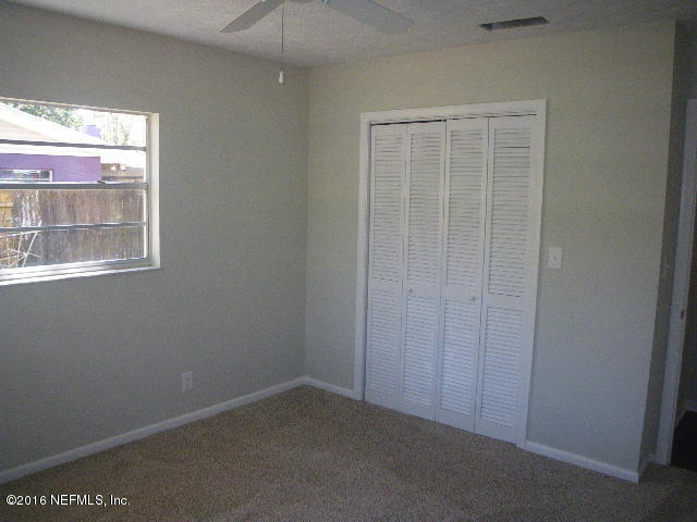402 Jasmine Road St. Augustine, FL 32086 - Photo 12 of 33 a view of an empty room with a window