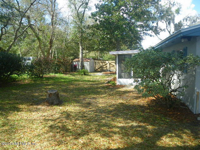 402 Jasmine Road St. Augustine, FL 32086 - Photo 25 of 33 a front view of a house with a yard