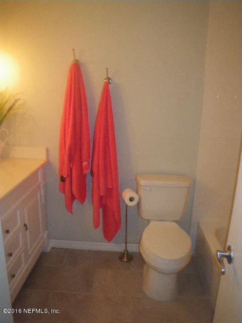 402 Jasmine Road St. Augustine, FL 32086 - Photo 30 of 33 a bathroom with a toilet and a shower