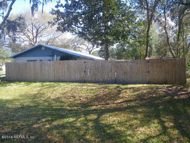 402 Jasmine Road St. Augustine, FL 32086 - Photo 32 of 33 a backyard of a house