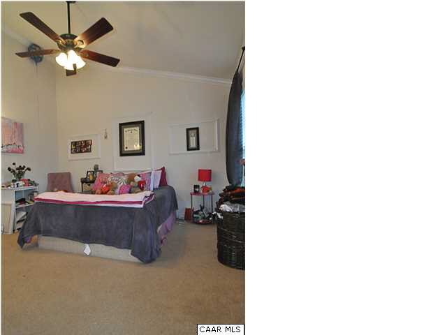 823 Rainier Road Charlottesville, VA 22903 - Photo 19 of 39 a living room with furniture and a chandelier