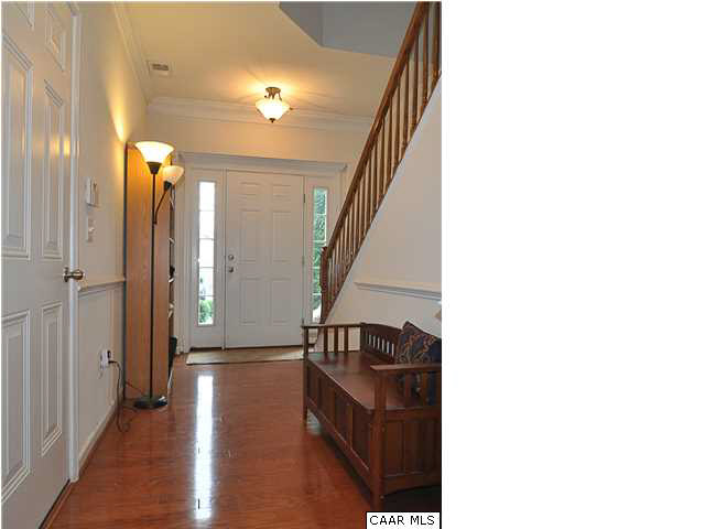 823 Rainier Road Charlottesville, VA 22903 - Photo 2 of 39 a view of a hallway with wooden floor
