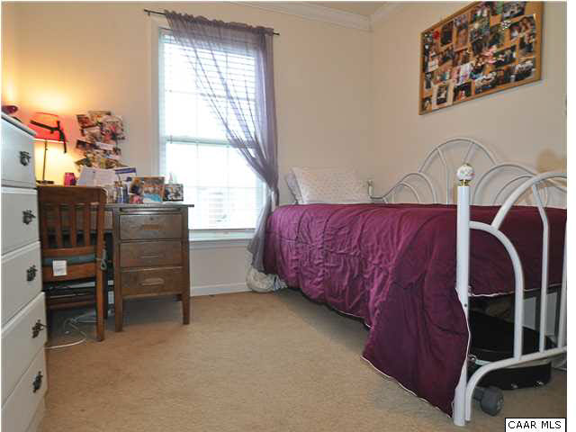 823 Rainier Road Charlottesville, VA 22903 - Photo 24 of 39 a living room with furniture and two windows
