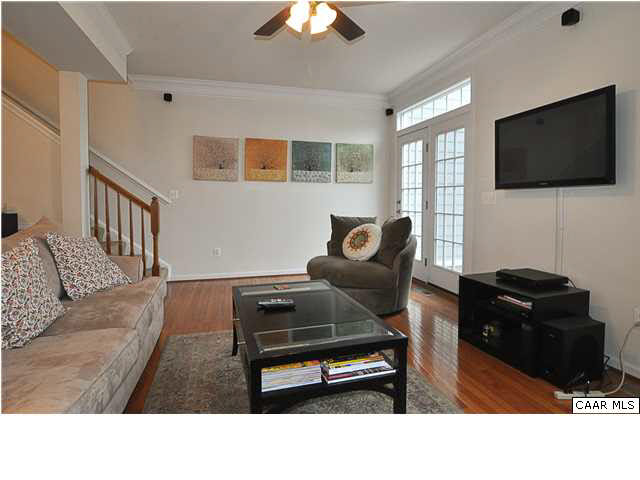 823 Rainier Road Charlottesville, VA 22903 - Photo 26 of 39 a living room with furniture and a flat screen tv