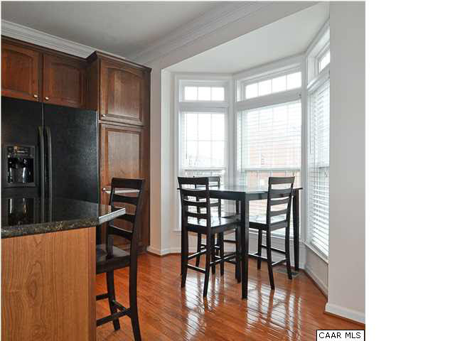823 Rainier Road Charlottesville, VA 22903 - Photo 36 of 39 a view of a dining room with furniture and a window