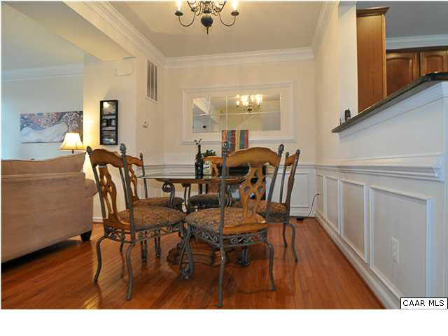 823 Rainier Road Charlottesville, VA 22903 - Photo 9 of 39 a dining room with furniture and wooden floor