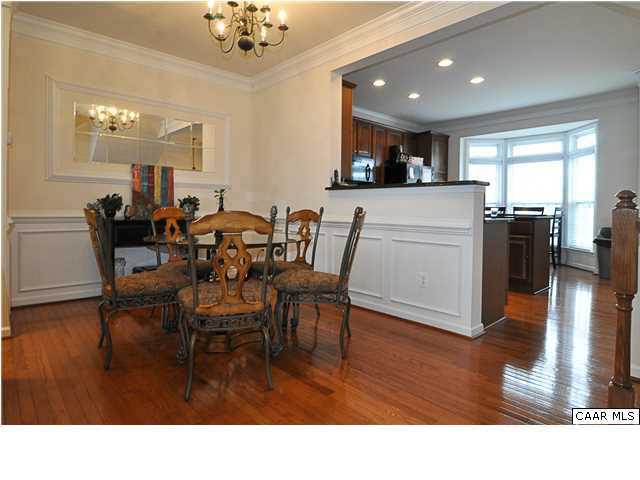 823 Rainier Road Charlottesville, VA 22903 - Photo 10 of 39 a living room with lots of furniture and kitchen view