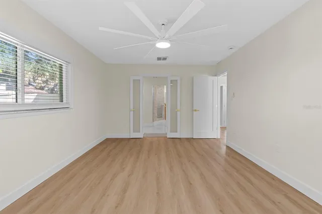 a bathroom with a sink double vanity and a mirror