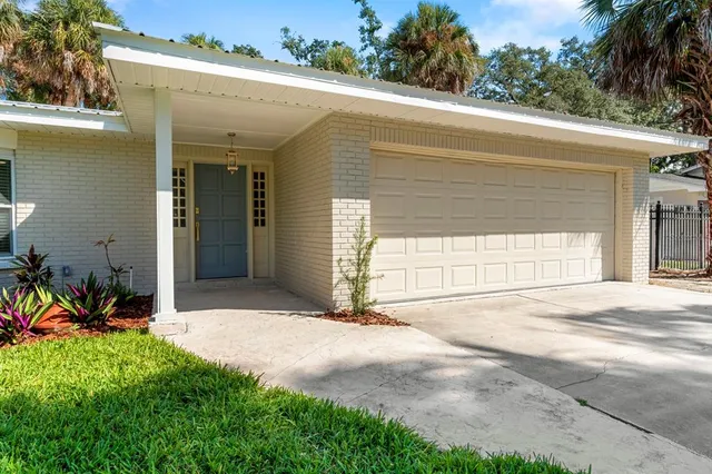 a view of a livingroom with furniture and hardwood floor