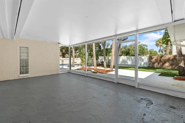 a backyard of a house with lots of green space