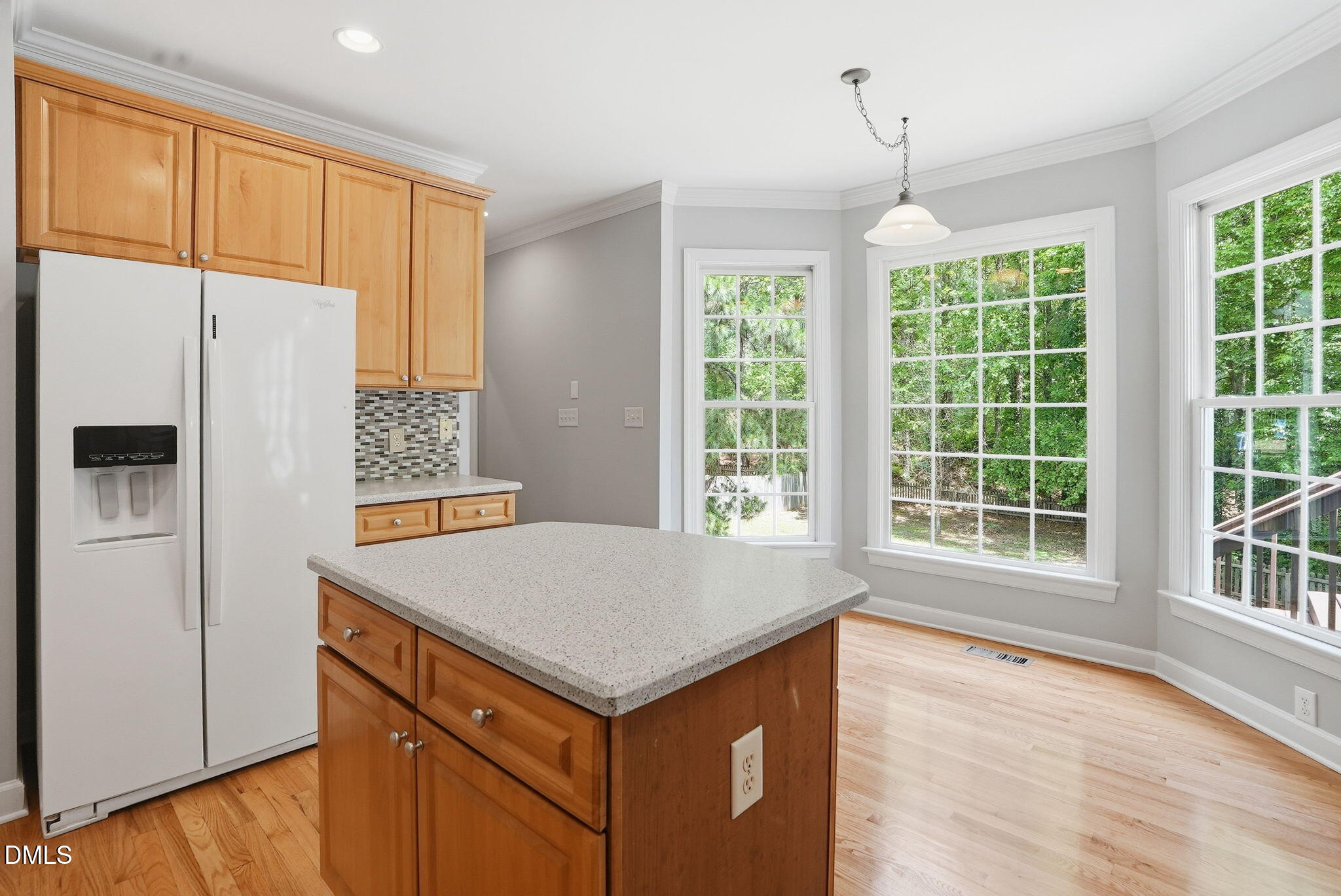 7 Morgans Ridge Lane Durham, NC 27707 - Photo 29 of 75 a kitchen with a refrigerator a stove top oven and a large window