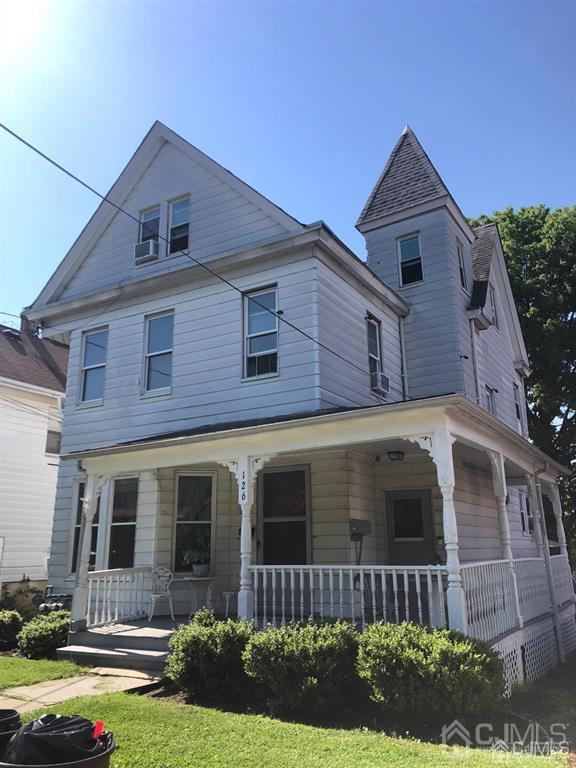126 West High Street Bound Brook, NJ 08805 - Photo 2 of 4 a front view of a house with garden