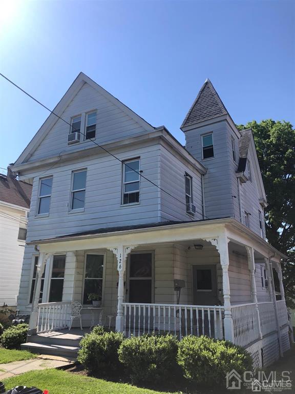 126 West High Street Bound Brook, NJ 08805 - Photo 3 of 4 a front view of a house with garden