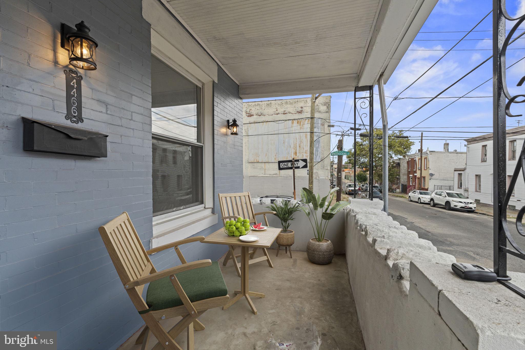 4466 North 3rd Street Philadelphia, PA 19140 - Photo 2 of 28 a view of a patio with chairs and potted plants