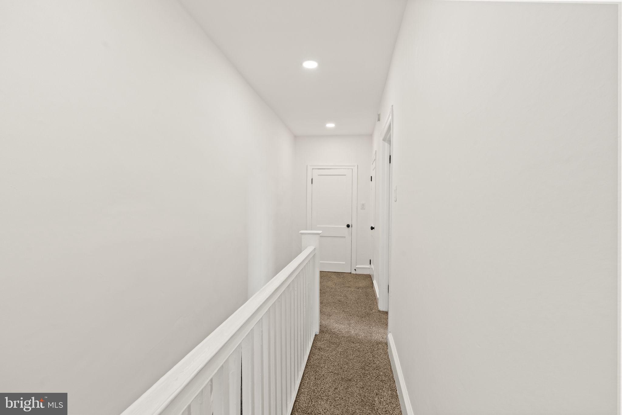 4466 North 3rd Street Philadelphia, PA 19140 - Photo 23 of 28 a view of a hallway with wooden floor