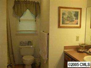 916 Stevens Road Monroe, NC 28110 - Photo 7 of 8 a bathroom with a sink and a toilet