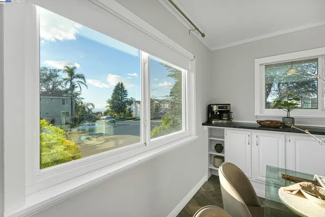 a kitchen with stainless steel appliances kitchen island granite countertop a sink and stove