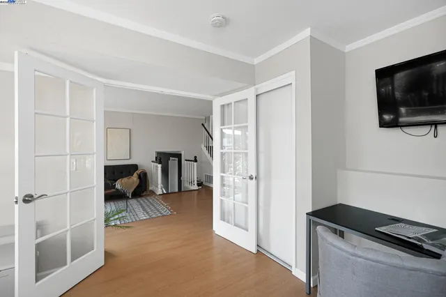 a lobby with furniture and view of bathroom