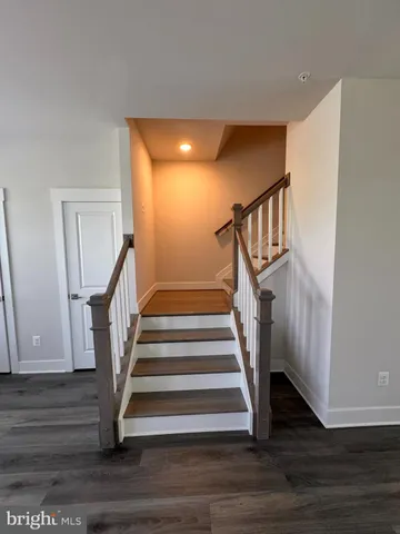 a view of entryway with wooden floor