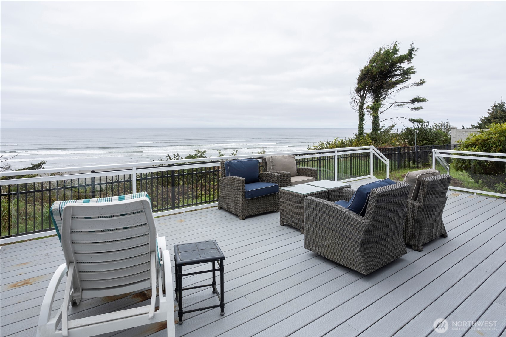 4631 Highway 109 Moclips, WA 98562 - Photo 21 of 35 a balcony with furniture and a potted plant