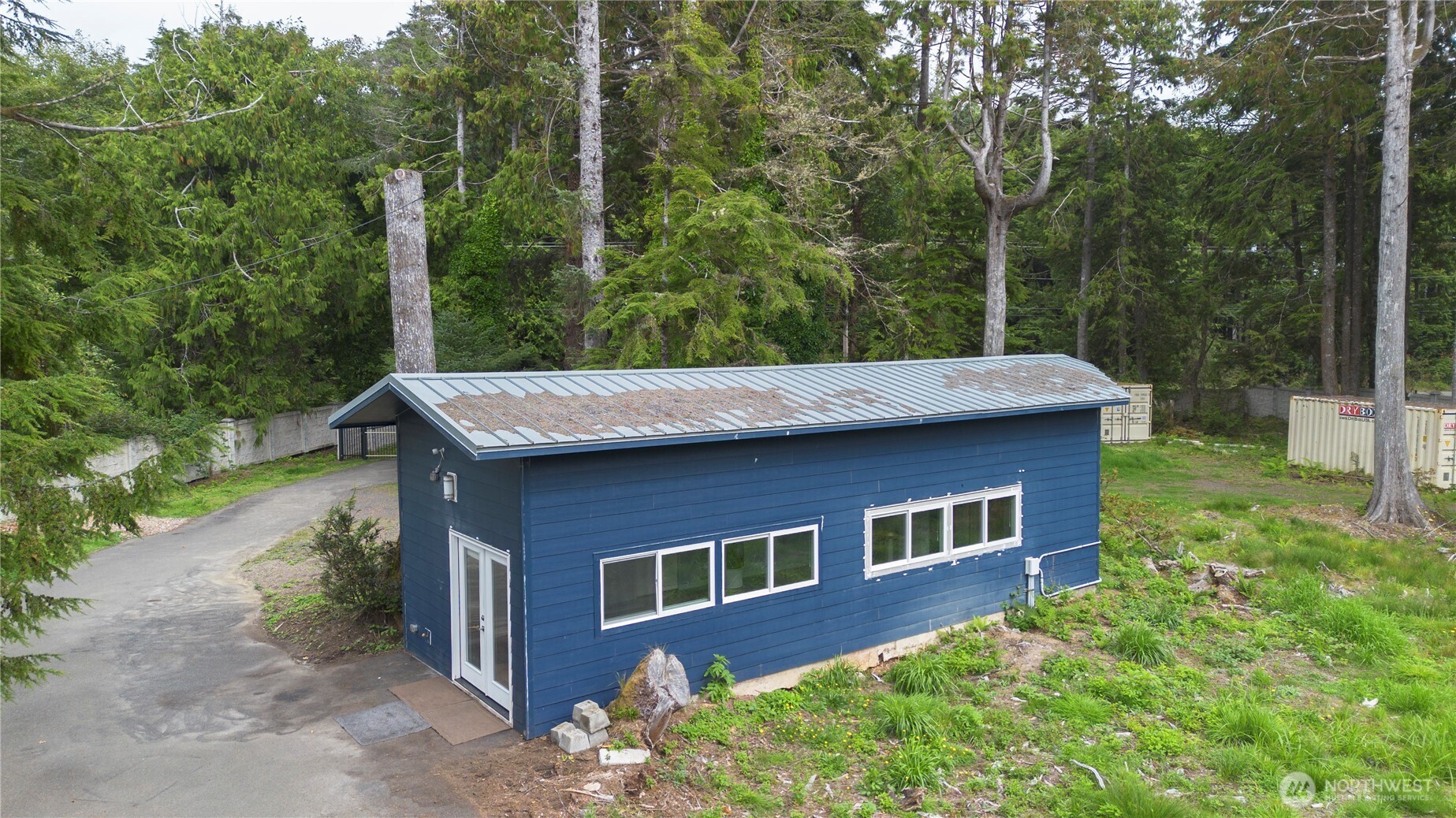 4631 Highway 109 Moclips, WA 98562 - Photo 29 of 35 a front view of a house with a yard