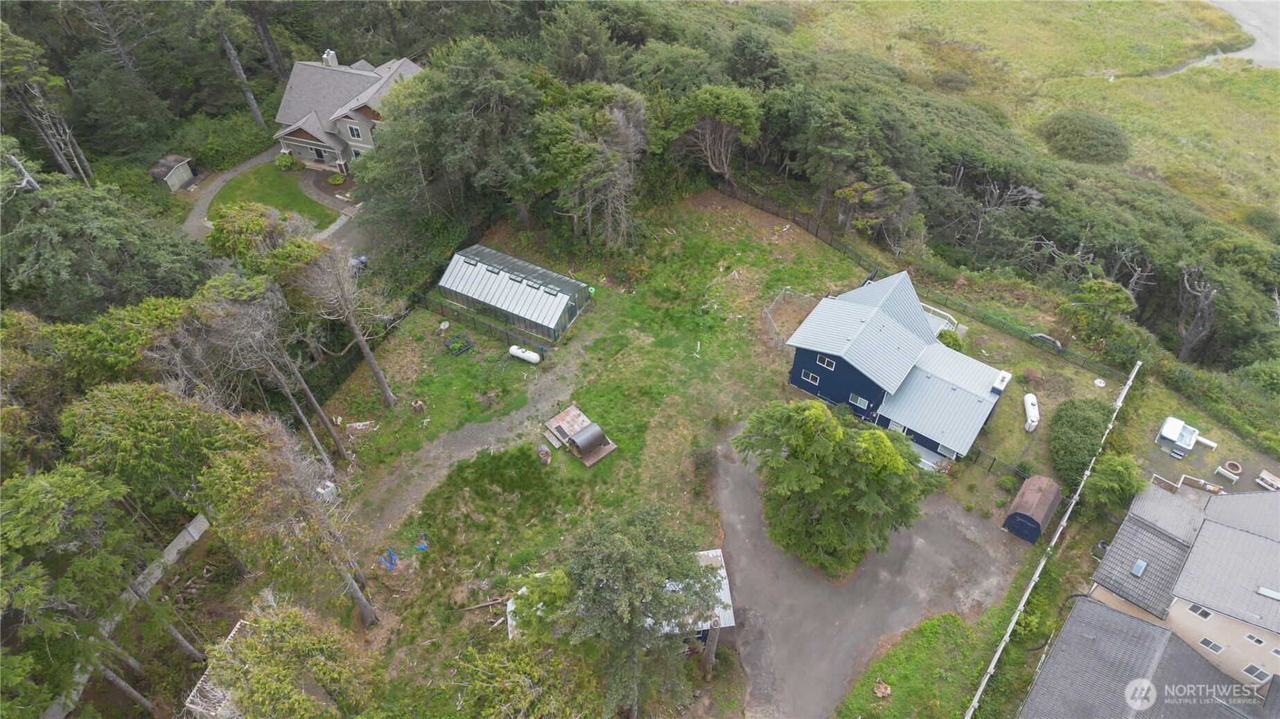 4631 Highway 109 Moclips, WA 98562 - Photo 35 of 35 an aerial view of a house with a yard