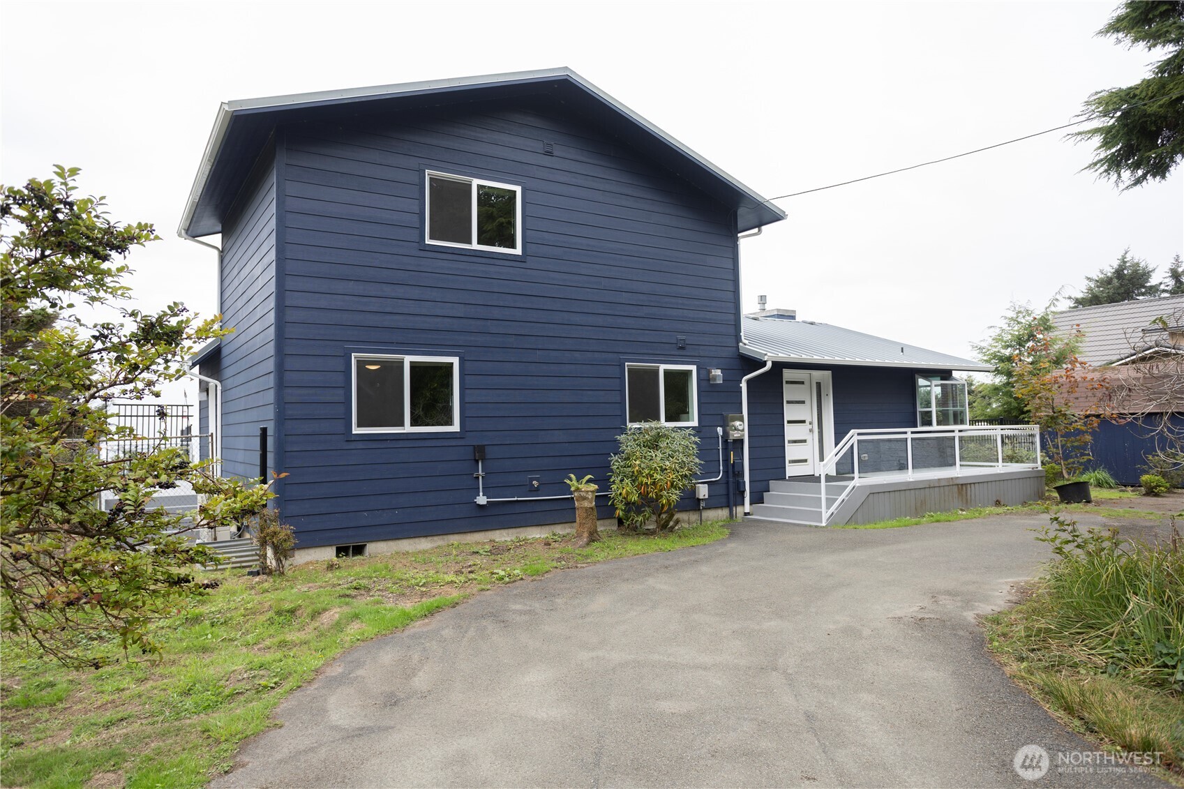 4631 Highway 109 Moclips, WA 98562 - Photo 4 of 35 a view of a house with a patio