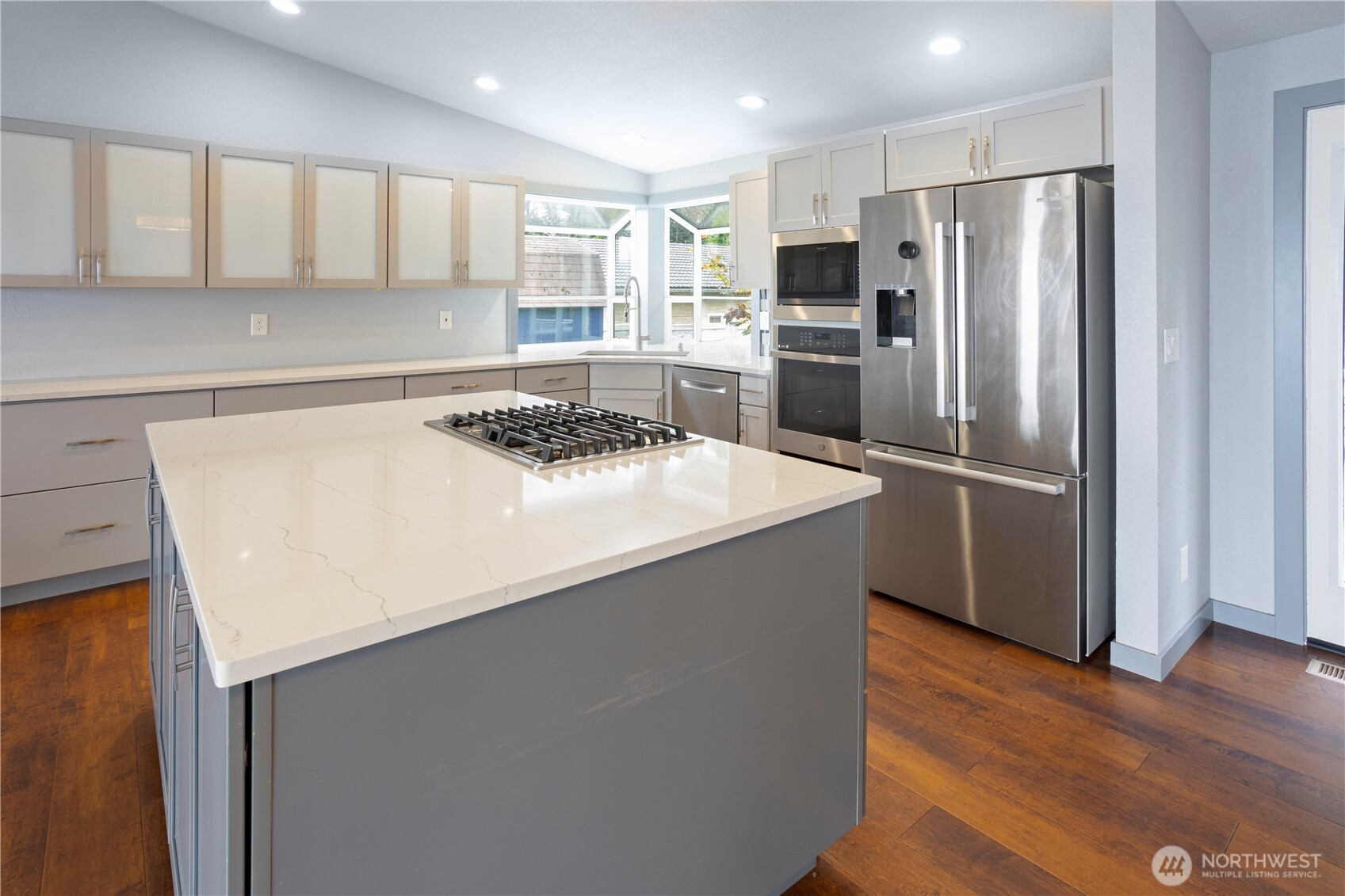 4631 Highway 109 Moclips, WA 98562 - Photo 6 of 35 a kitchen with stainless steel appliances a refrigerator and a stove