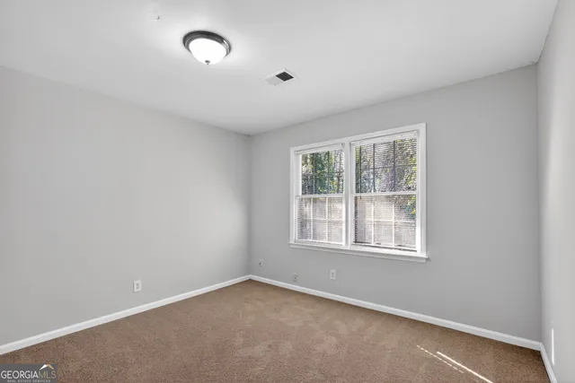 an empty room with a window