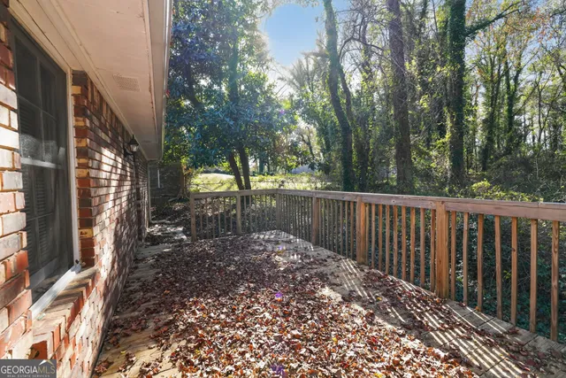 a view of backyard with green space