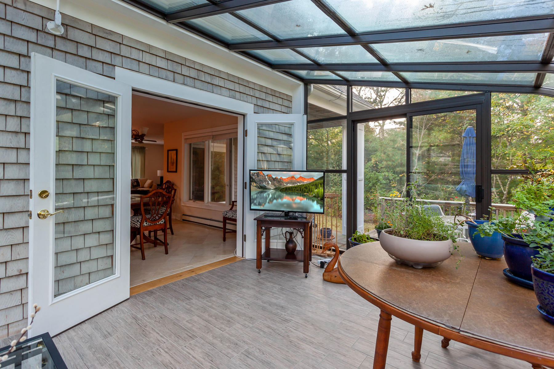 131 Rickenbacker Road East Falmouth, MA 02536 - Photo 10 of 34 a living room with furniture and a potted plant